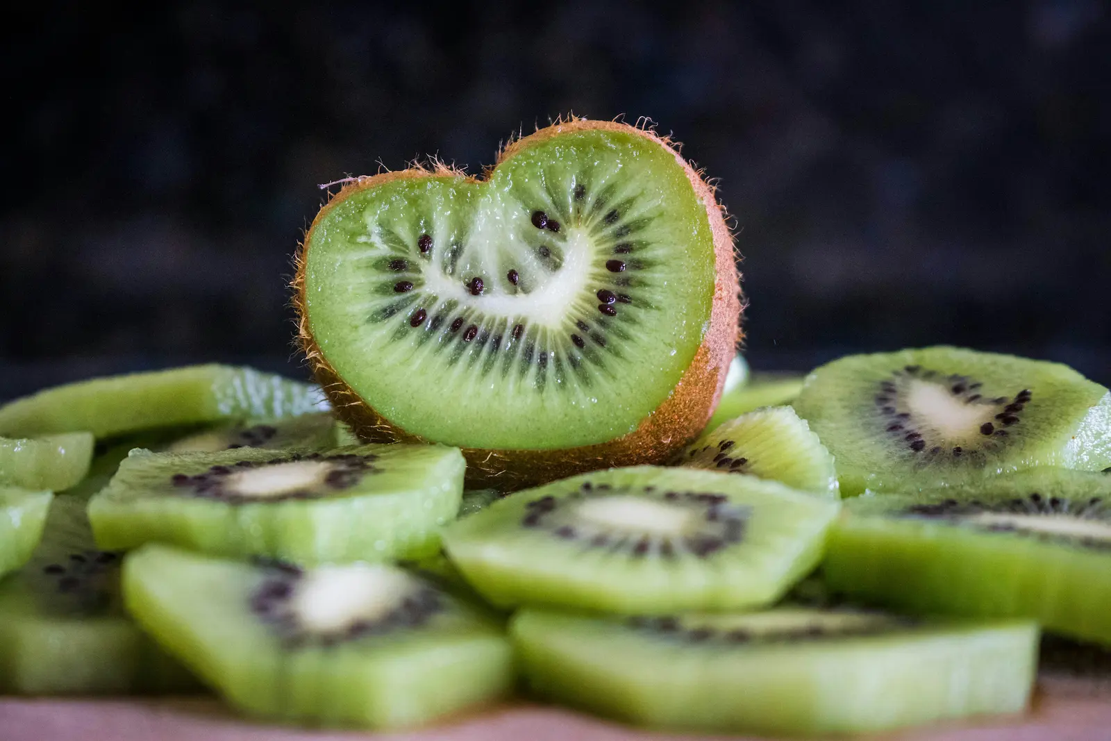 slices of kiwi fruit in the shape of hearts, depicting a healthy heart